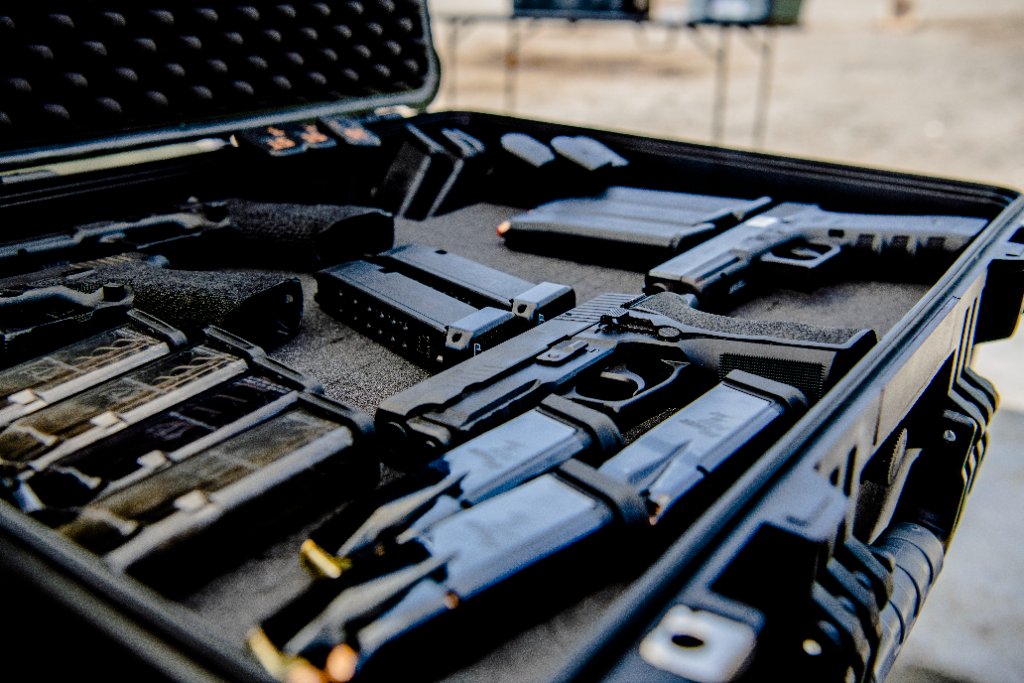 Professional firearms case with training pistols