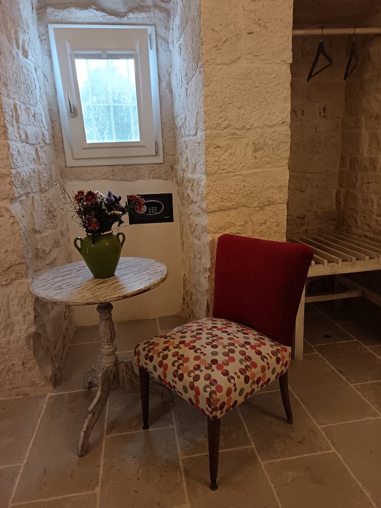 Cozy bedroom corner with vintage chair