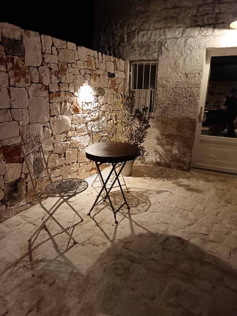 Intimate courtyard seating at night
