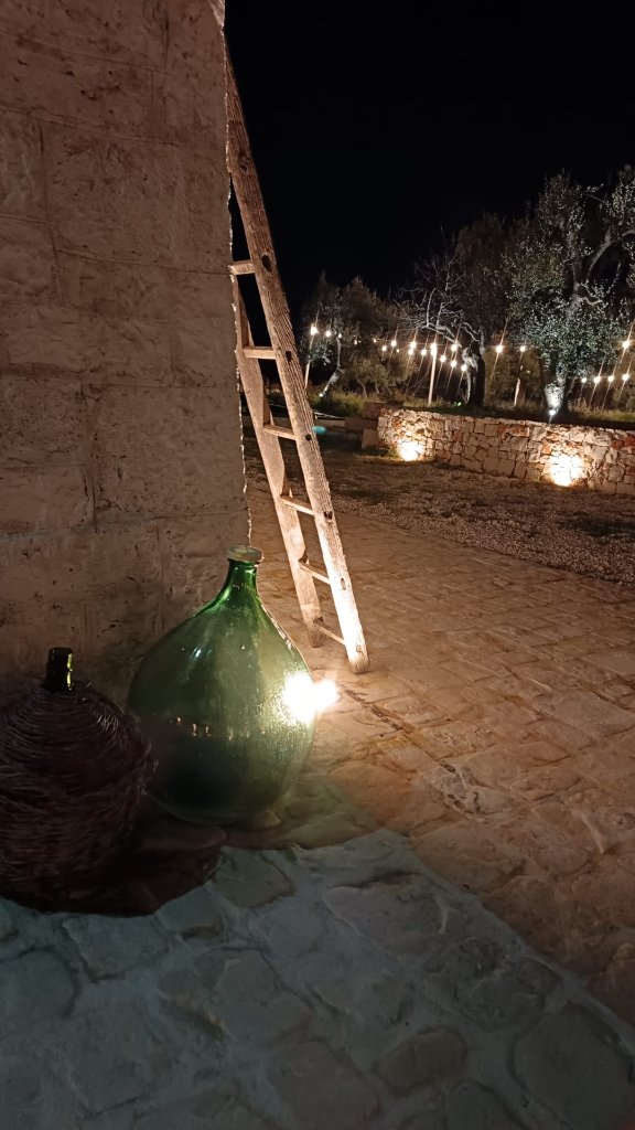 Trulli evening decor with traditional ladder