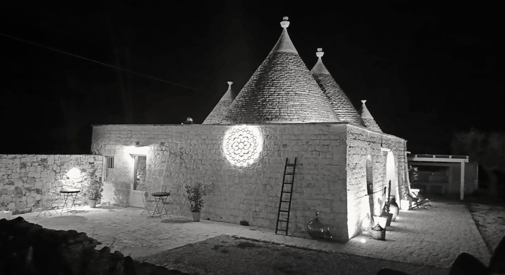 Trulli illuminated in black and white