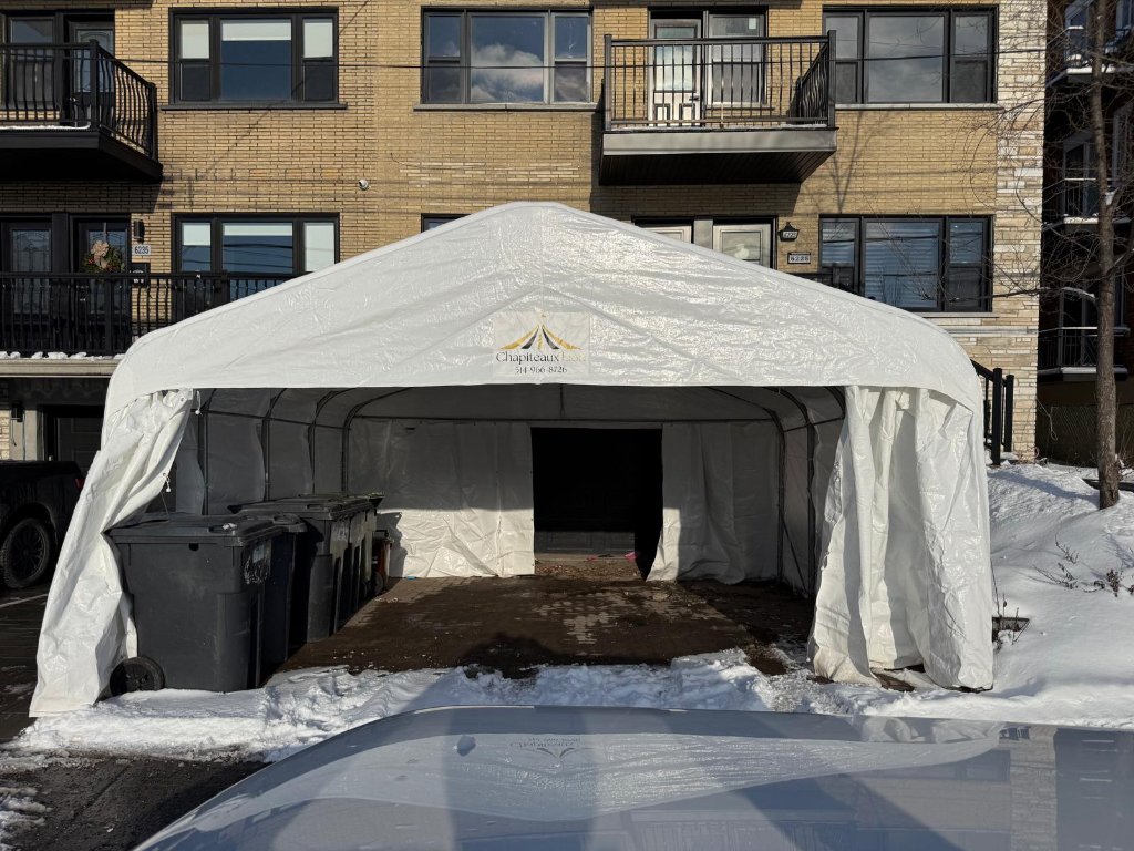 Abri auto double installé à Laval