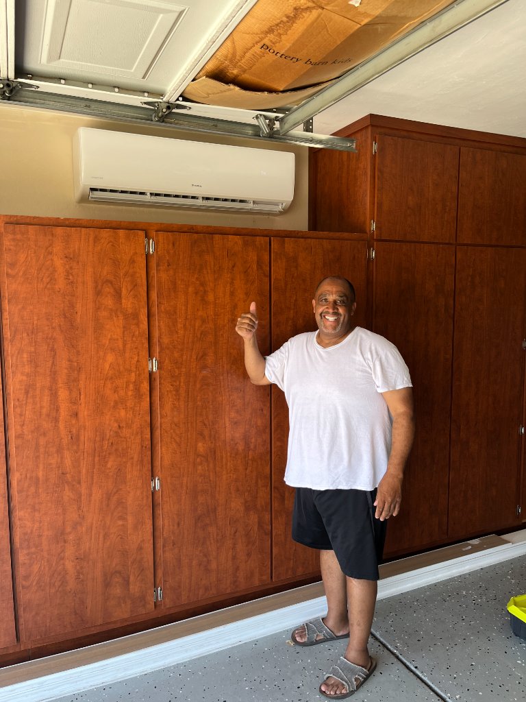 Happy customer with new garage mini split installation Gilbert AZ