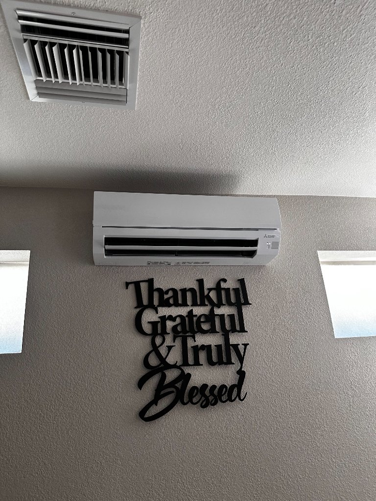 Professional mini split installation on Arizona home exterior wall