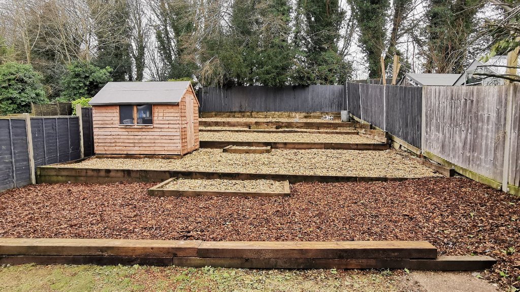 After: neglected lawn in Basingstoke mowed, edged and cleared of garden waste