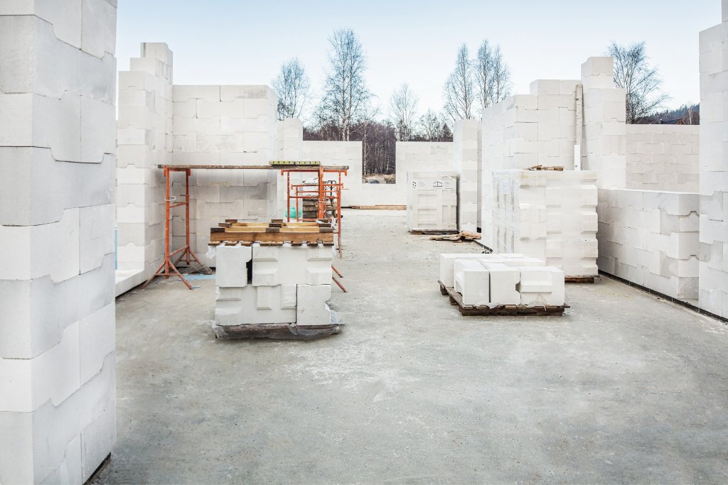 System 3E US rollout - modular wall construction blocks staged on pallets for American jobsite delivery