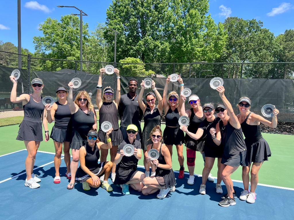 Coach Tee with ALTA and USTA league players during team training