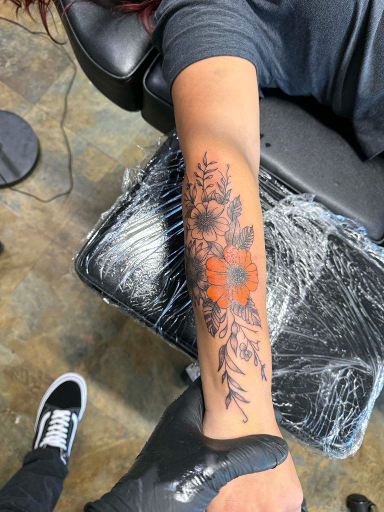 Floral forearm with color accent