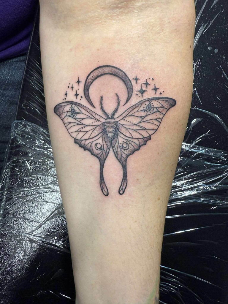 Moth with moon and stars