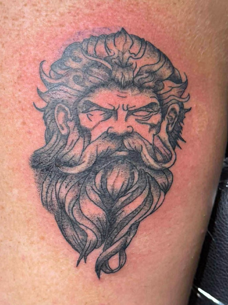Zeus portrait tattoo