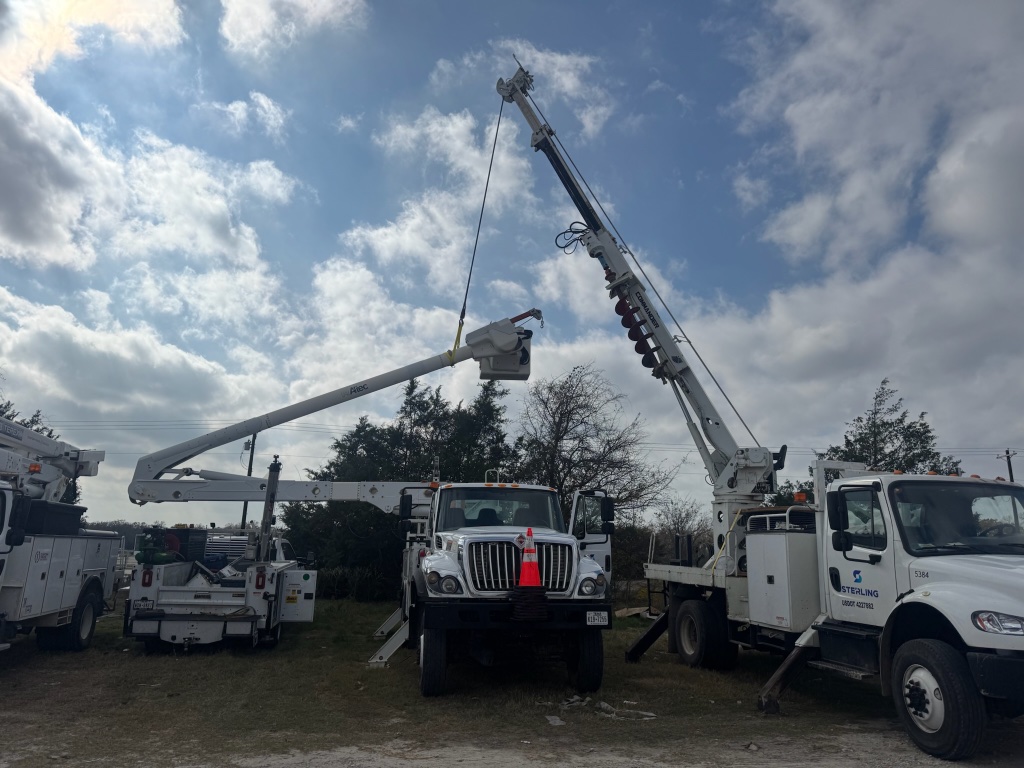 Bucket truck boom fully extended during utility fleet inspection — CRANETEC DFW service