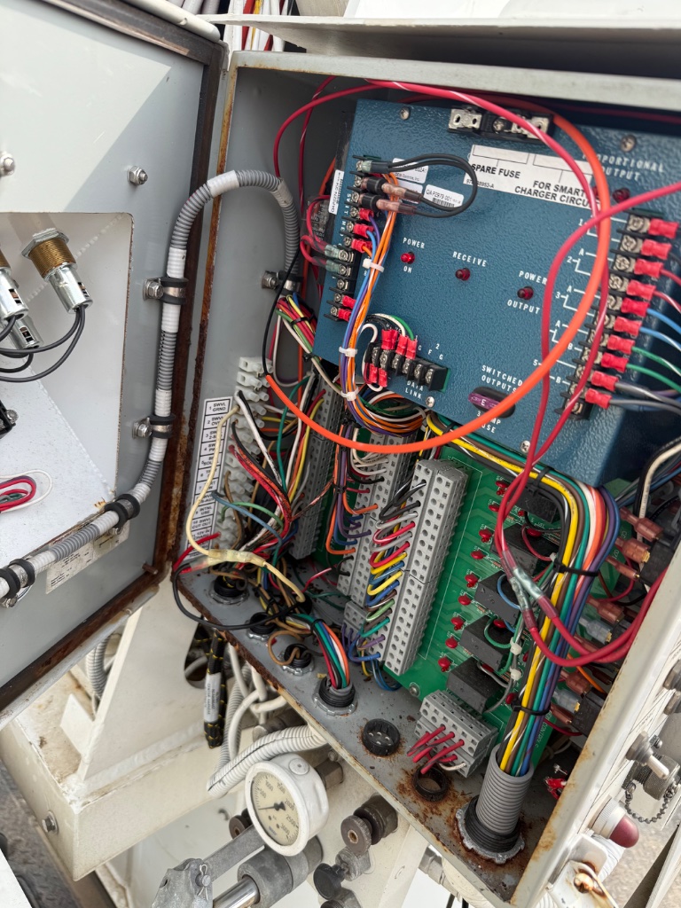 Bucket truck electrical control panel inspection — wiring and circuit board service DFW utility fleet