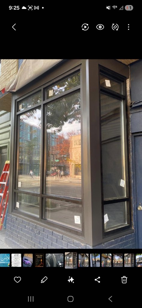 Commercial storefront glass system being repaired