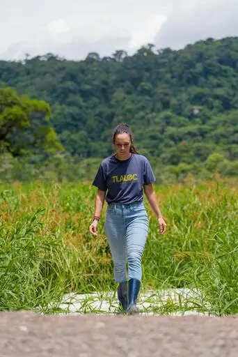 Biologist Valeria Aspinall conducting research in the wetlands