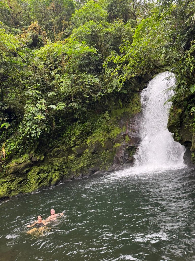 Swimming at waterfall