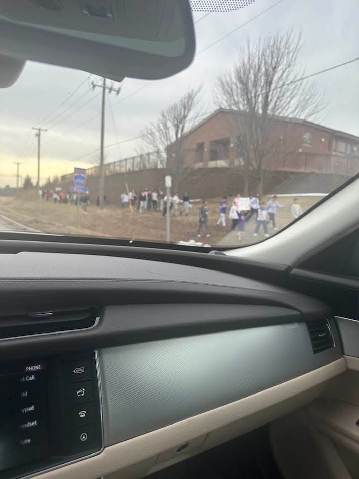Students visible from roadway during school hours