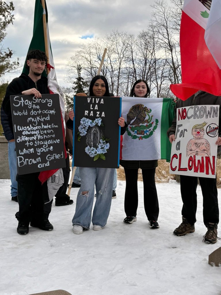 Protesters with signs and flags