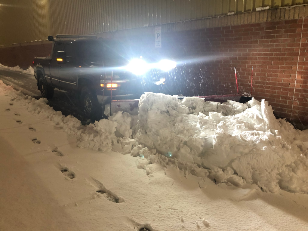 Commercial snow removal at night