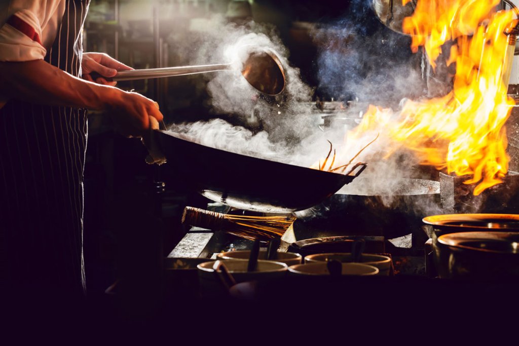 Chef Robert cooking with wok
