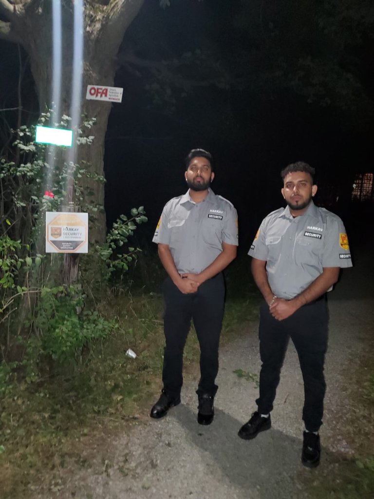 Guards with patrol vehicle