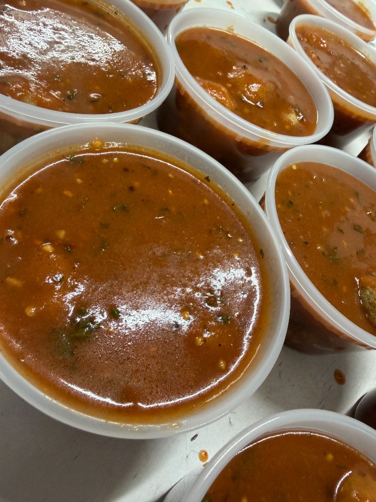 Fresh curry preparations in containers - Bytown Tiffins kitchen Ottawa