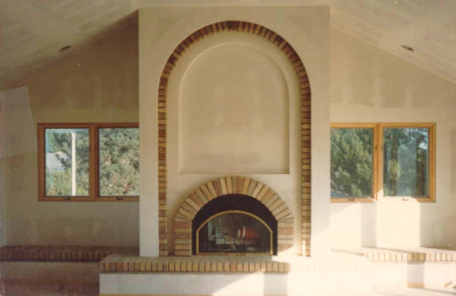 Arched Brick Fireplace with Alcove