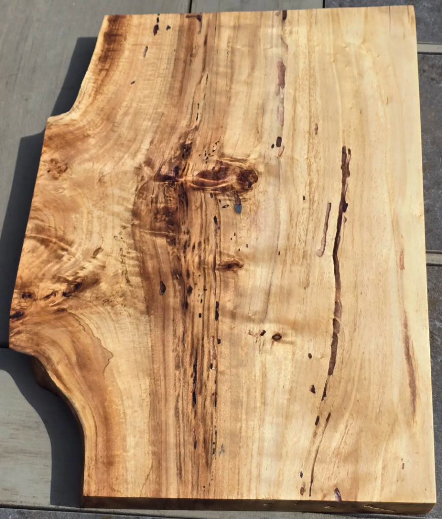 Charcuterie Board with a Bullet - maple board with bullet slug