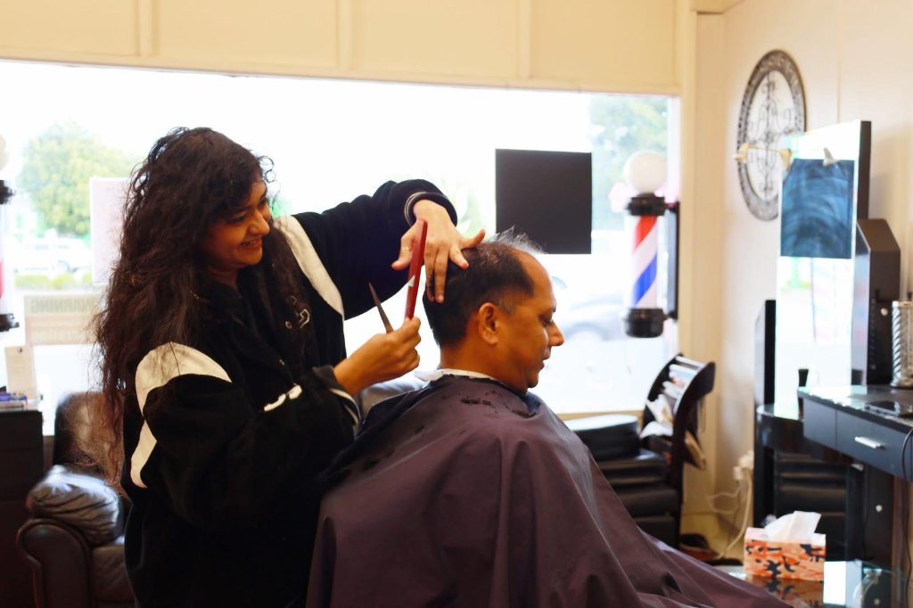 Hiral at work at Alexander's Barbershop