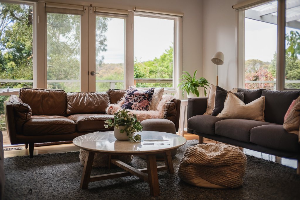 Living room with forest views