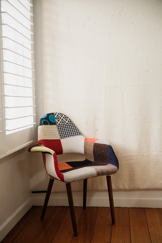 Patchwork chair by window