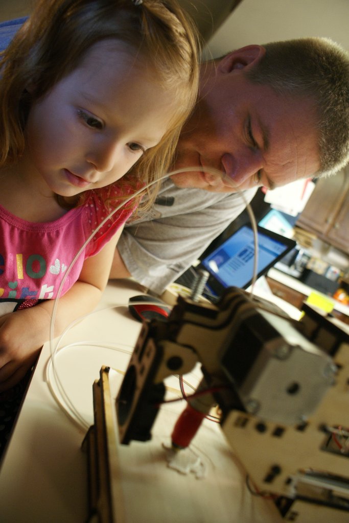 Building Together - Father and daughter working on projects together builds lasting memories