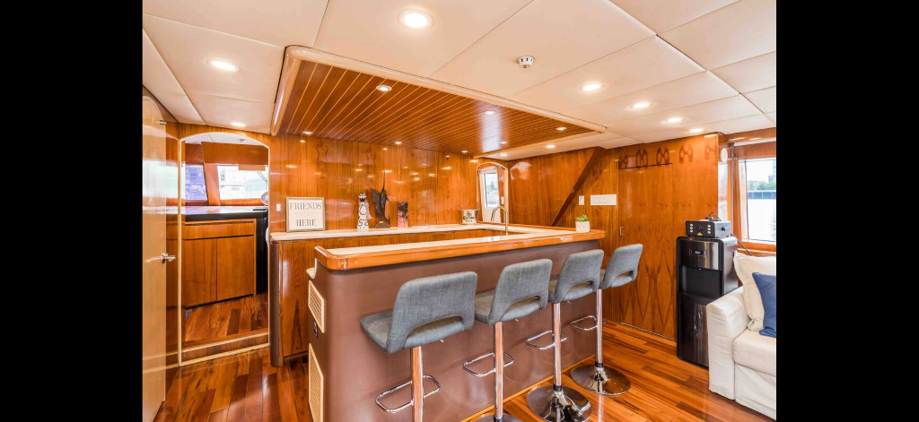 Bar area with wood finishes and elegant decor