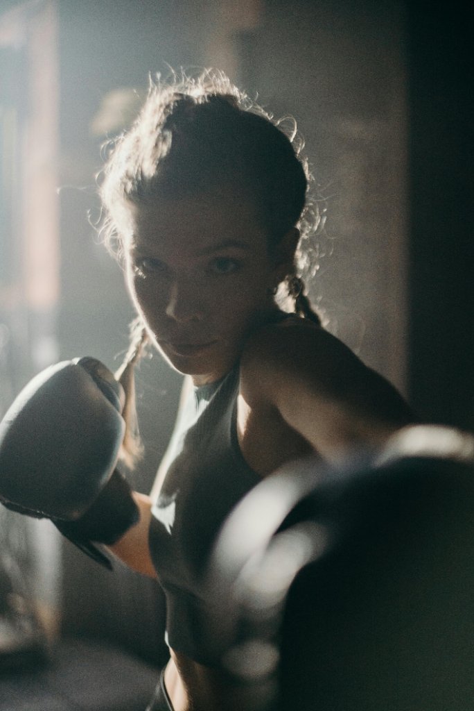 Woman kickboxing training