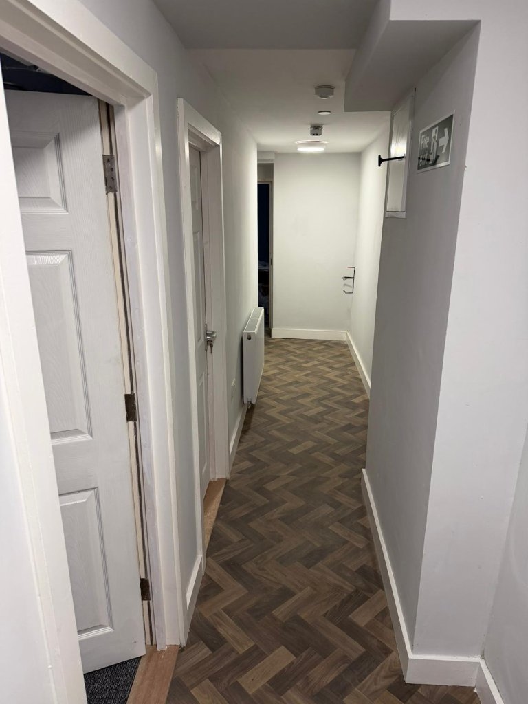 Walter Road — Corridor with herringbone flooring