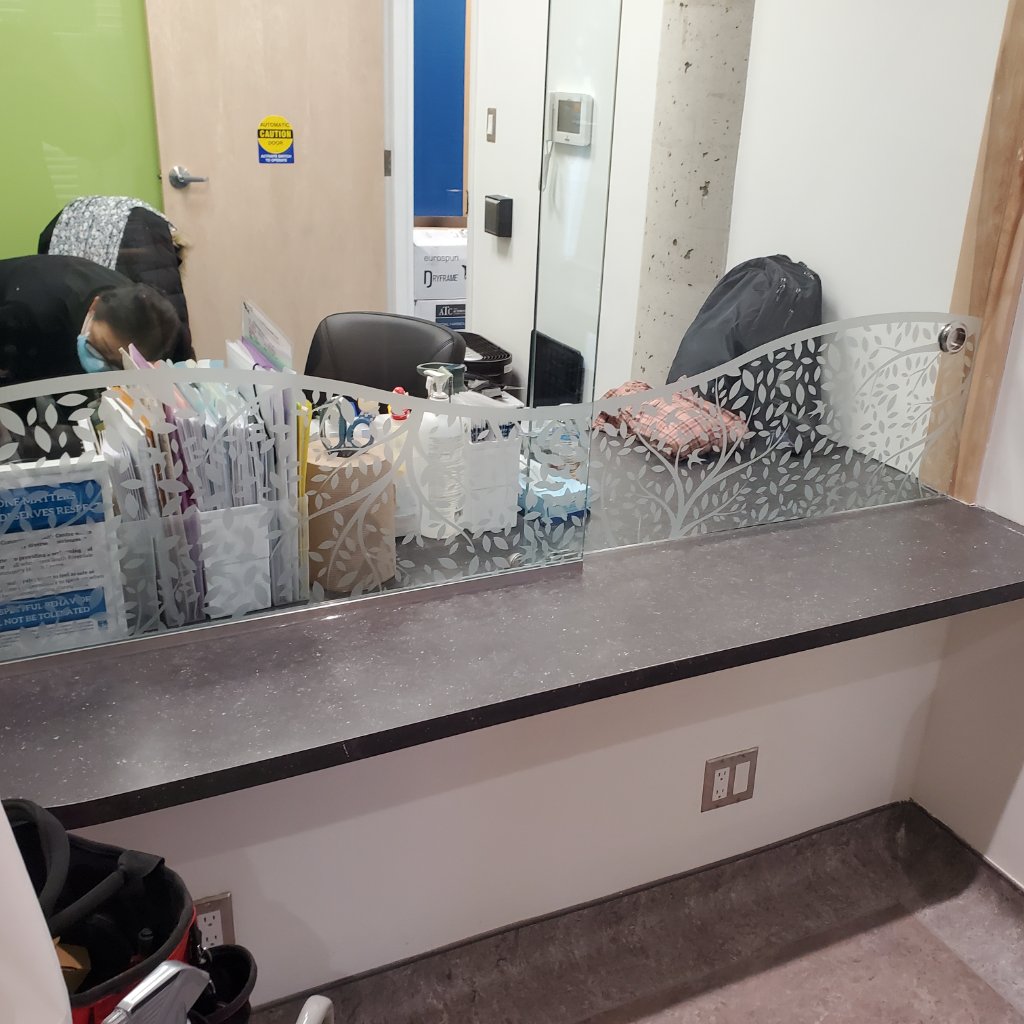 South Riverdale CHC - Reception Desk with Tree Mural