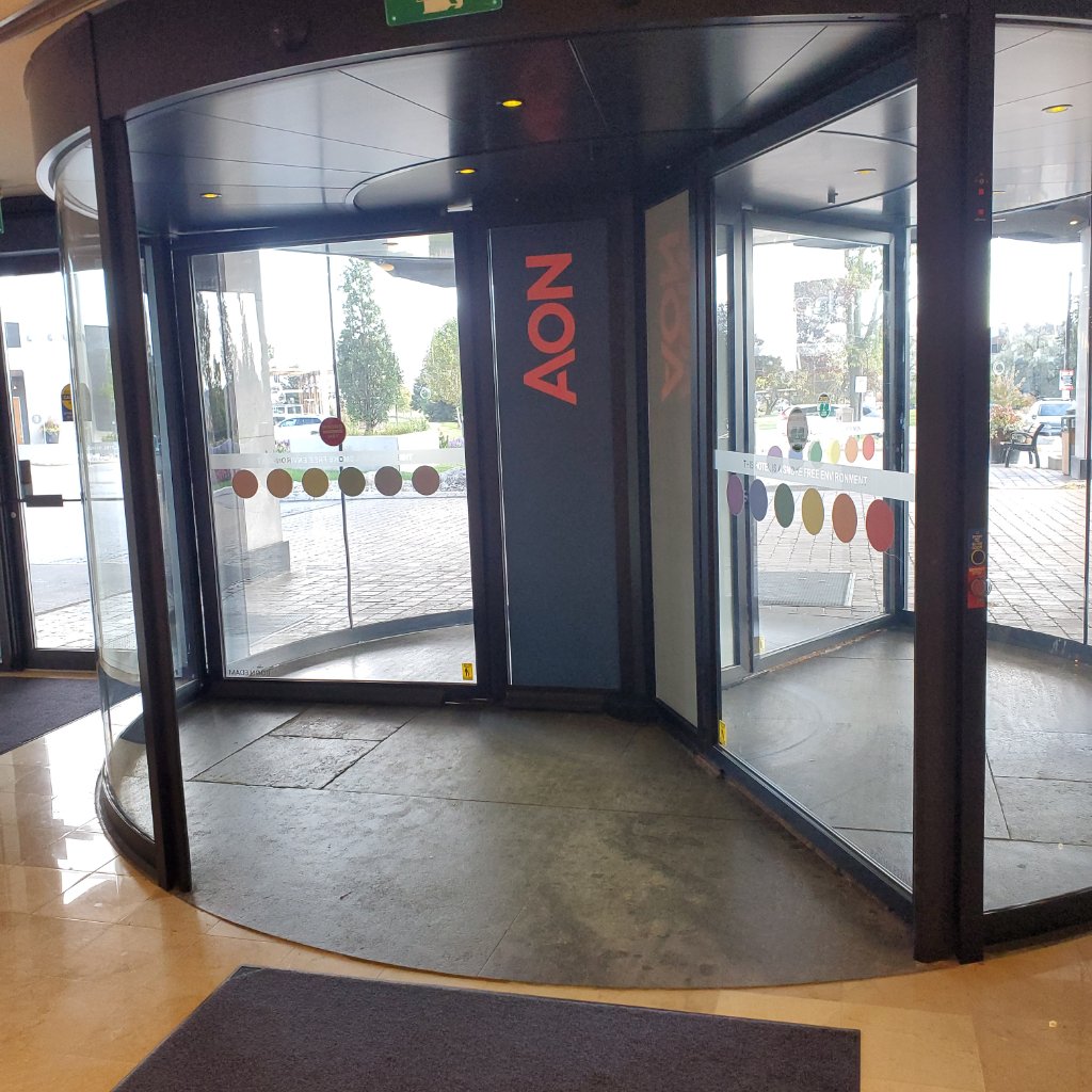 Aon - Revolving Door Interior Branding