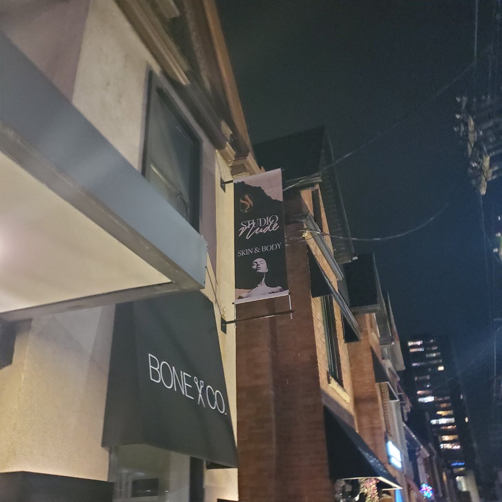 Studio Nude - Exterior Blade Banner Night View