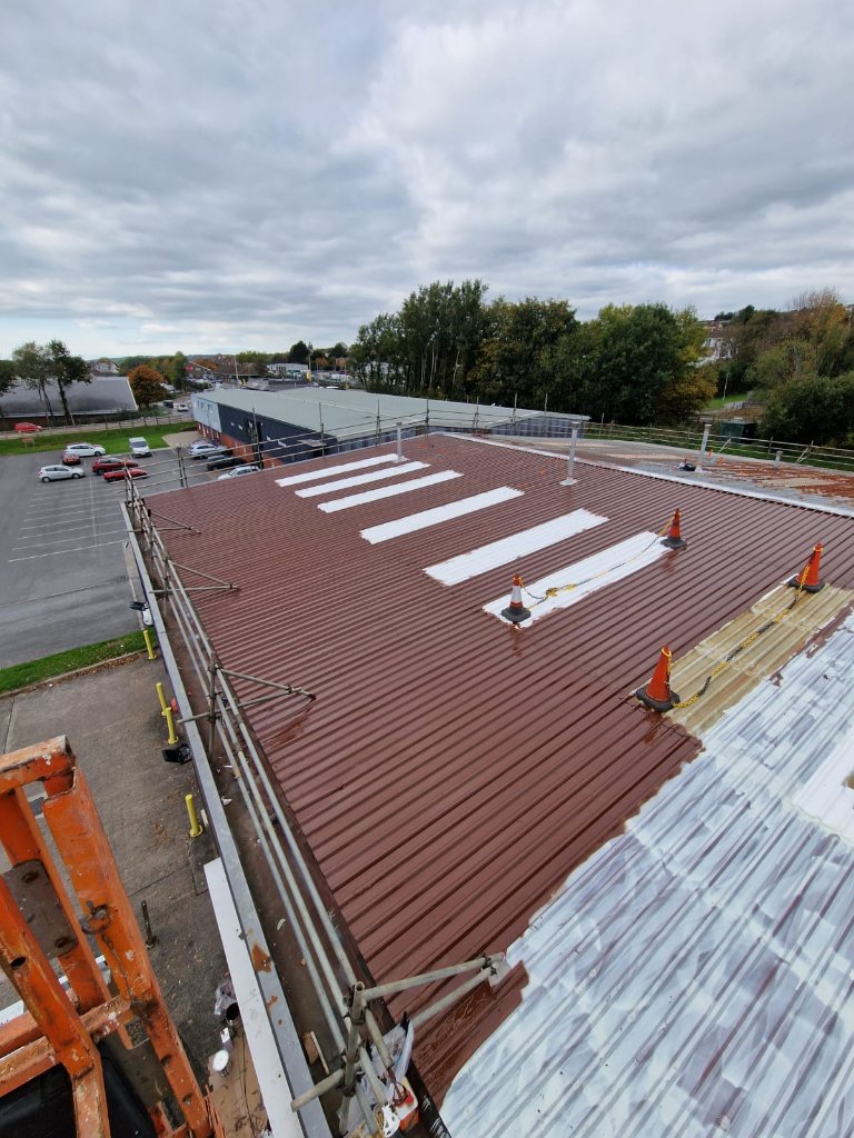Controlled preparation and coating across profiled roof sheets