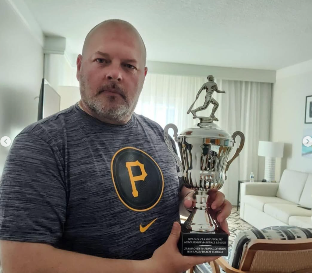 Rick Fryman with Championship Trophy