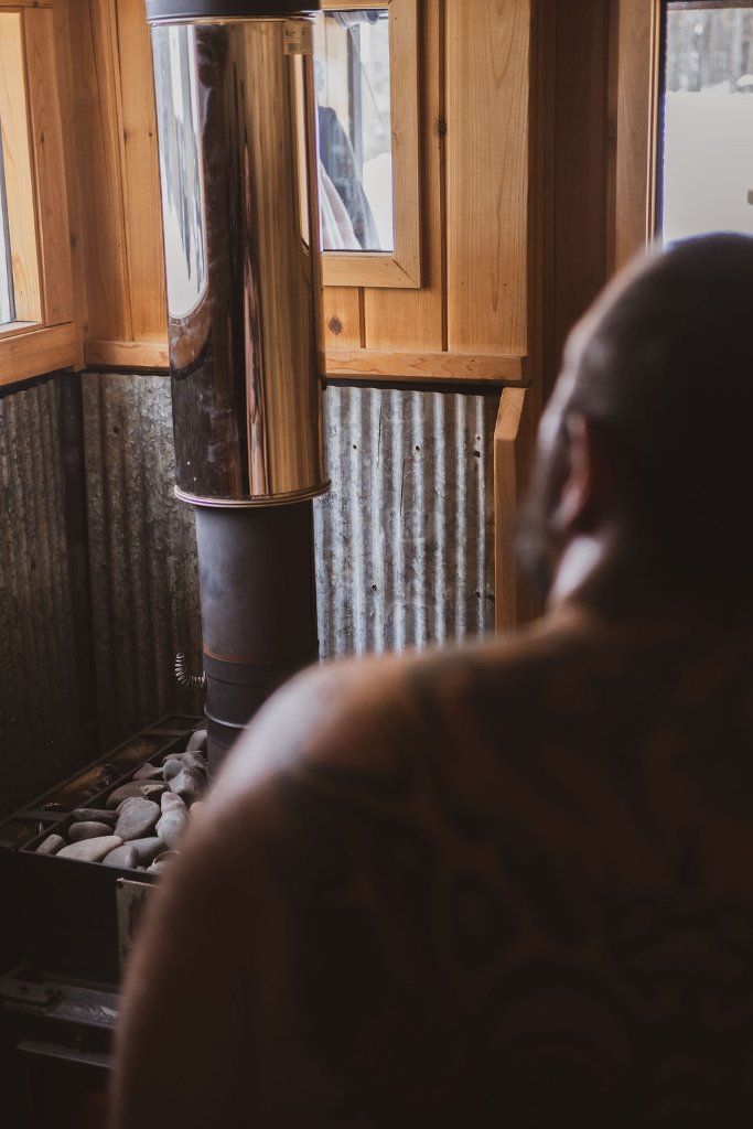 Guest relaxing in sauna