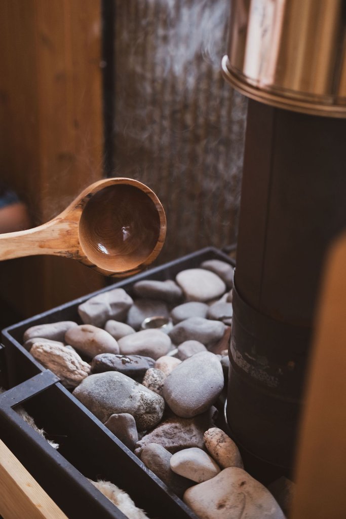 Wooden ladle pouring water