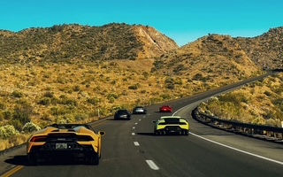 DRVN supercar convoy on a desert highway