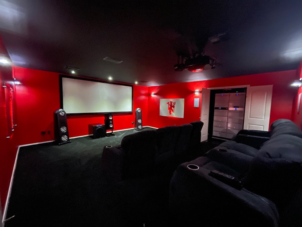 Modern home theater room with ambient lighting
