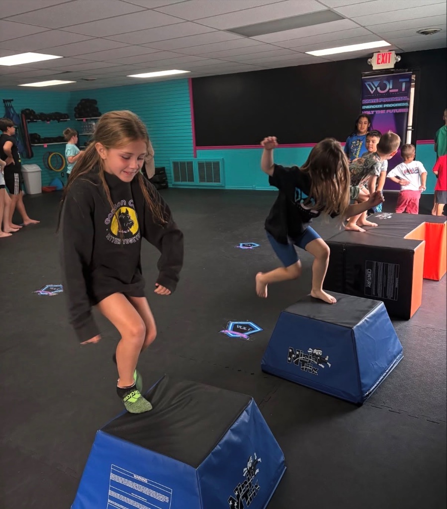 Kids doing obstacle course