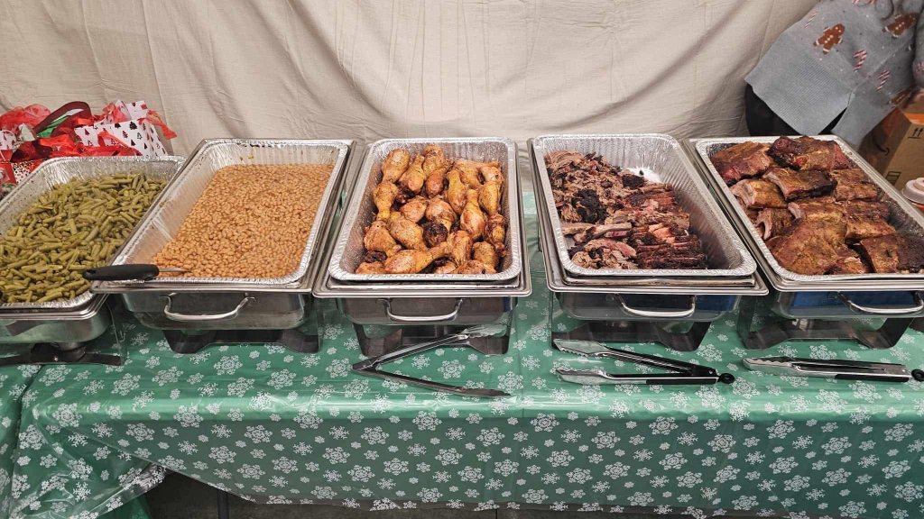 Smoked chicken and ribs at event