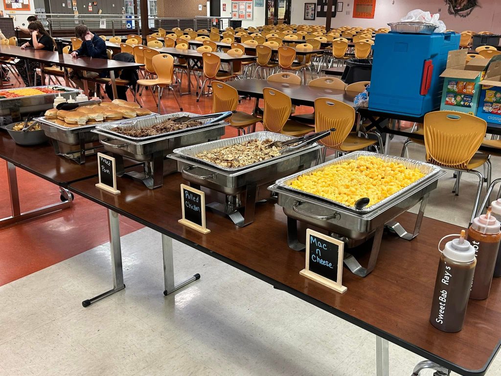 BBQ catering buffet line with guests