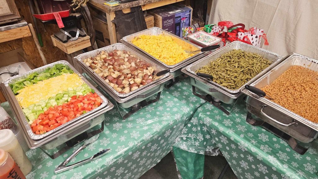 BBQ catering buffet setup with sides