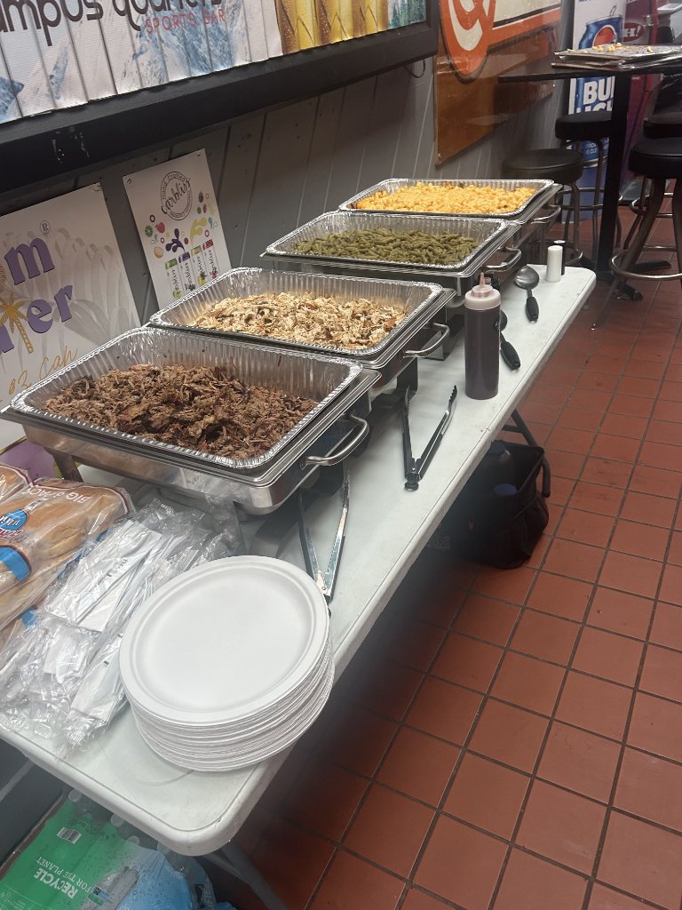 Smoked brisket and ribs catering display