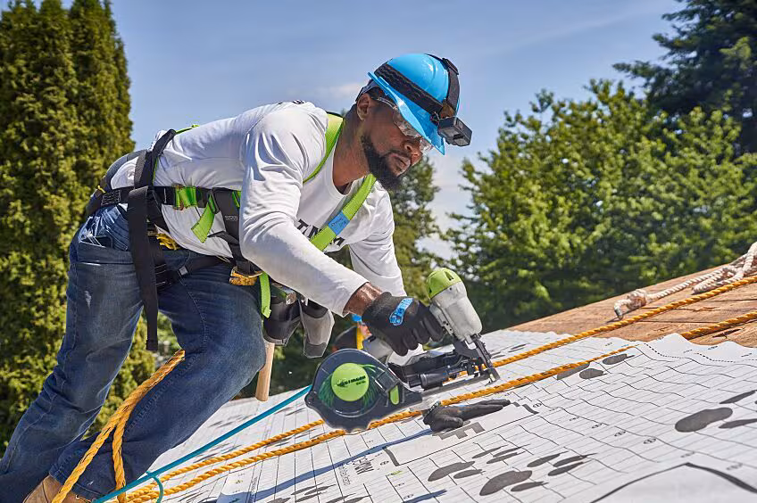 Iconic Roofing installer installing a new roof