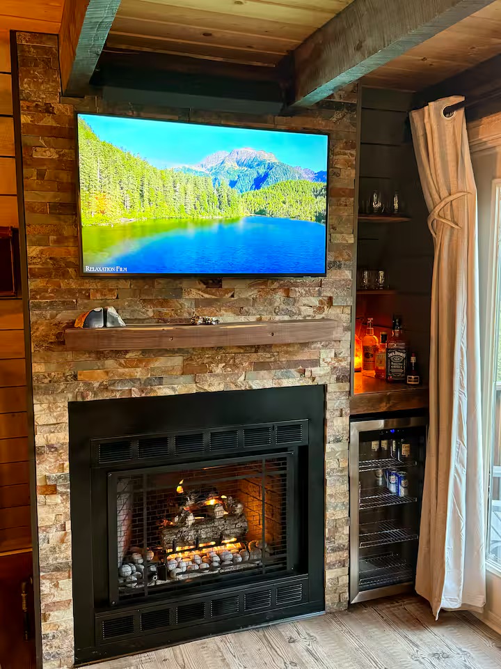 Living Room - Stone Fireplace & TV